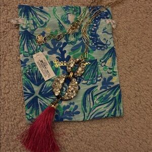 Lilly Pulitzer Strut Your Stuff necklace with dust bag.gold/pink